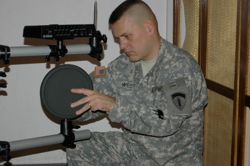 Army Spc. Assembles Drum Set for Chapel Praise Team in Germany
