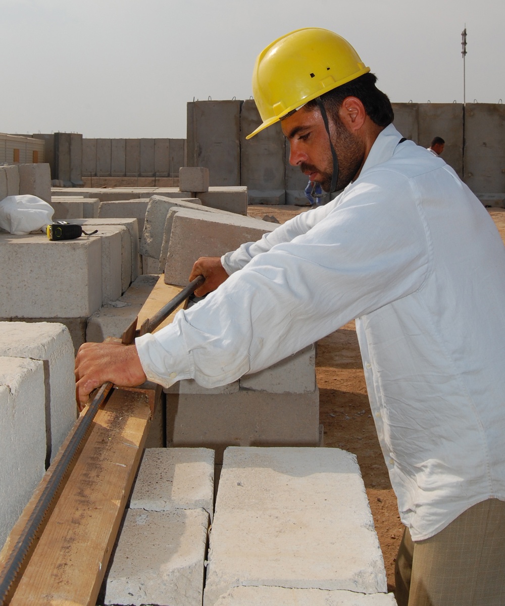 Iraqi Engineers Oversee Housing Trailer Construction at Contingency Operating Base Basra