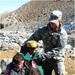 U.S. Soldier Provides Warm Blanket to Afghan Resident