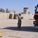 Army Spc. Directs Cargo Truck at Kandahar Airfield