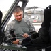 Army Warrant Officer Conducts Preflight Safety Check in Iraq