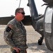 Army Chief Warrant Officer Conducts Preflight Safety Check in Iraq