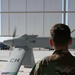 Air Force Crew Chief Prepares Predator Drone for Launch