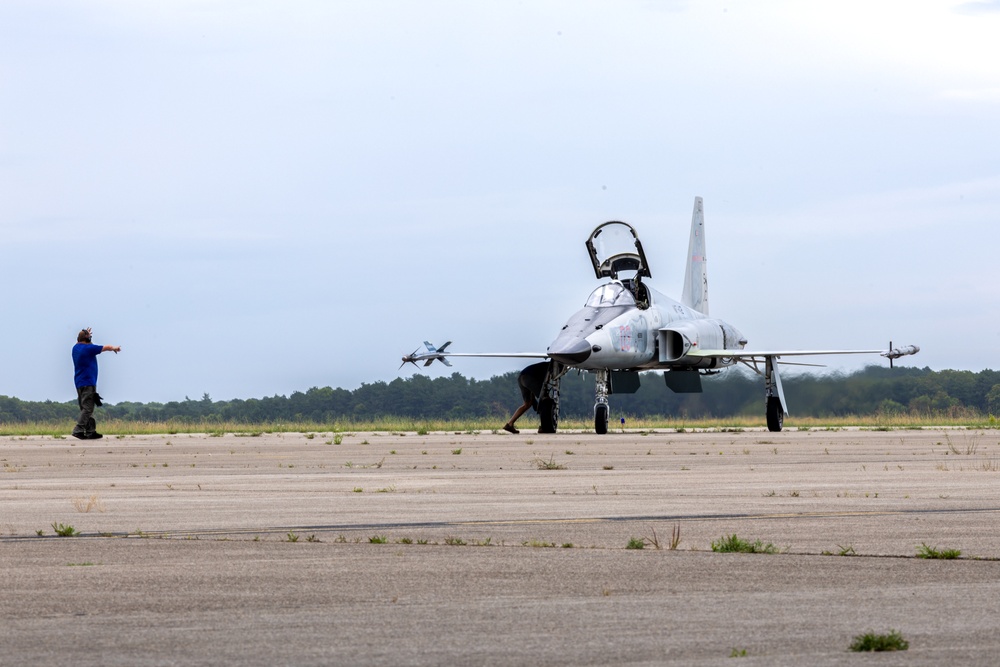 In Flight and Fuel: Marine Pilots fly an F-5 in Joint Base Cape Cod