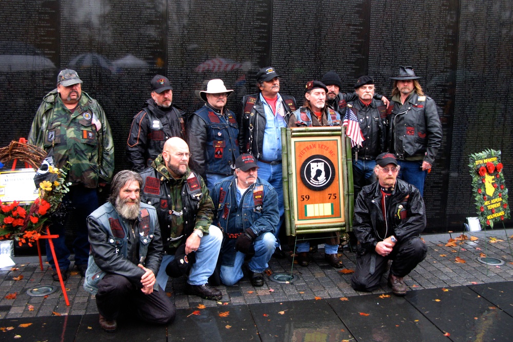 Visitors Honor Vietnam Veterans at Memorial Wall on Veterans Day