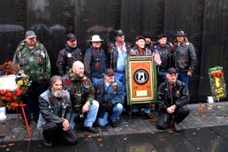 Visitors Honor Vietnam Veterans at Memorial Wall on Veterans Day