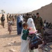 Afghan Soldiers Provide Aid to Displaced Civilians in Konduz