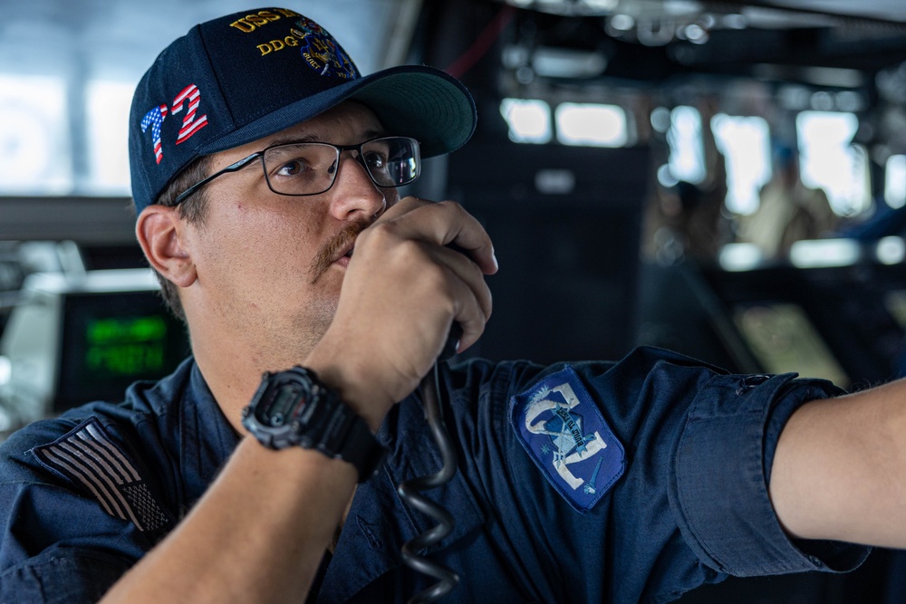 USS Mahan (DDG 72) Sailor Communicates From the Bridge