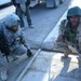 U.S. Soldier Collaborates with Iraqi Counterpart to Assess Bridge Condition