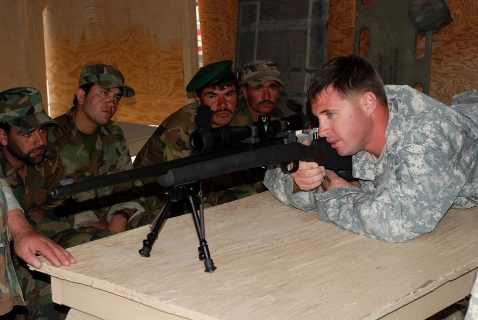 U.S. Soldier Trains Afghan Counterparts on Rifle Use