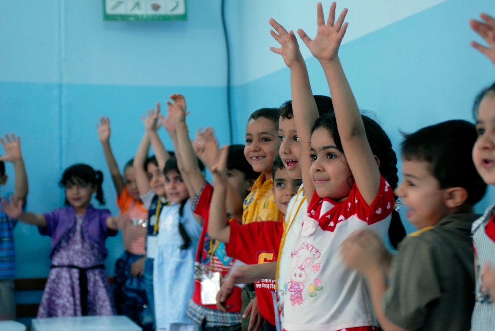 Iraqi Students Welcome Soldiers, Receive Care Packages
