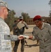 U.S. Army Officer Presents Training Certificate to Iraqi Soldier