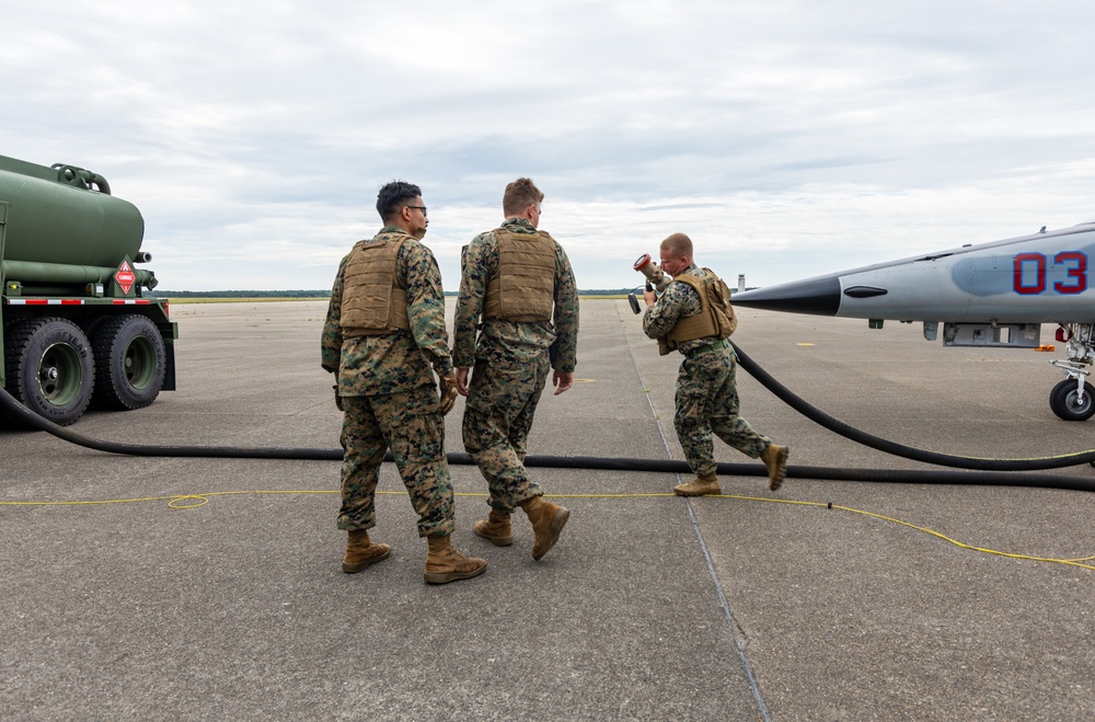 In Flight and Fuel: Marine Pilots fly an F-5 in Joint Base Cape Cod