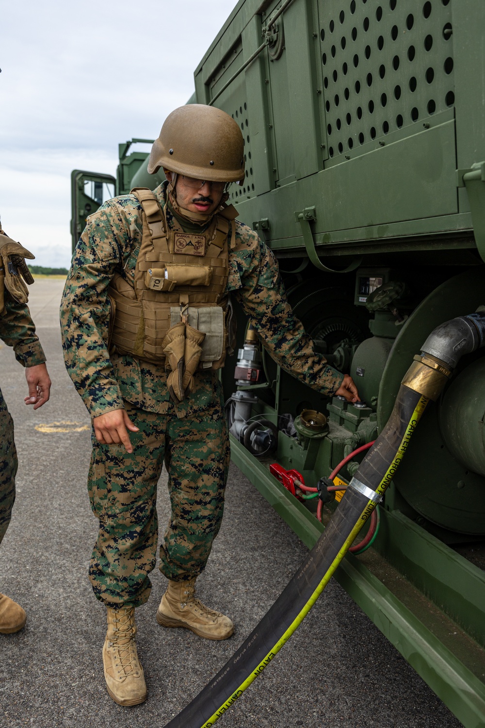 In Flight and Fuel: Marine Pilots fly an F-5 in Joint Base Cape Cod