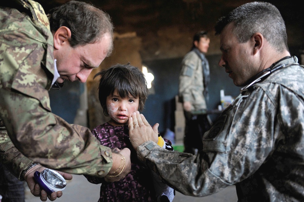 U.S., Italian Medics Provide Care to Afghan Child
