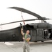 Army Staff Sgt. Prepares Black Hawk for Early Morning Flight