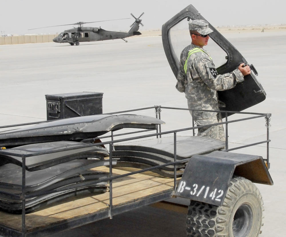 Army Staff Sgt. Prepares Black Hawk for Early Morning Flight
