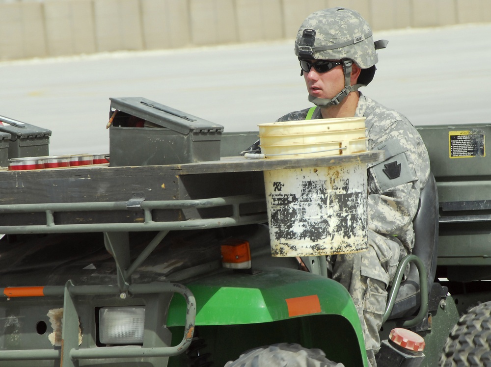 Army Staff Sgt. Prepares Black Hawk for Early Morning Flight