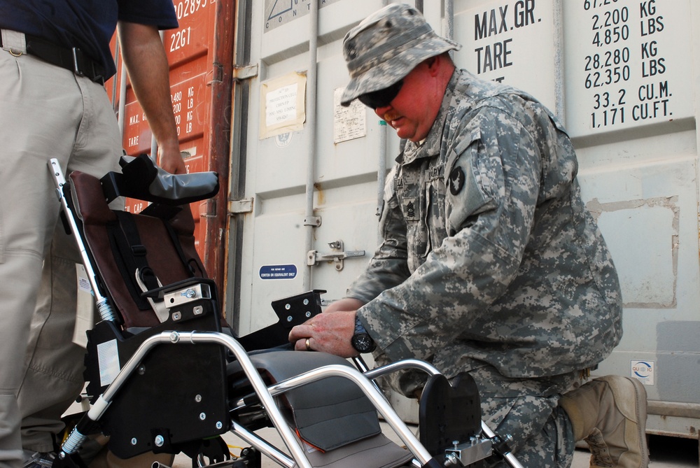 Army Master Sgt. Assembles Wheelchairs for Iraqi Children