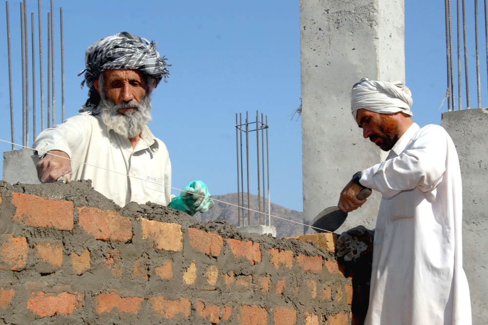 Workers Build Internal Wall for New School in Afghanistan's Kunar Province