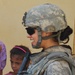 Army Spc. Ikram Mansori Connects with Iraqi Girls During Humanitarian Mission