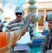 Iraqi Project Manager and U.S. Army Soldier Discuss Basra Market Opening