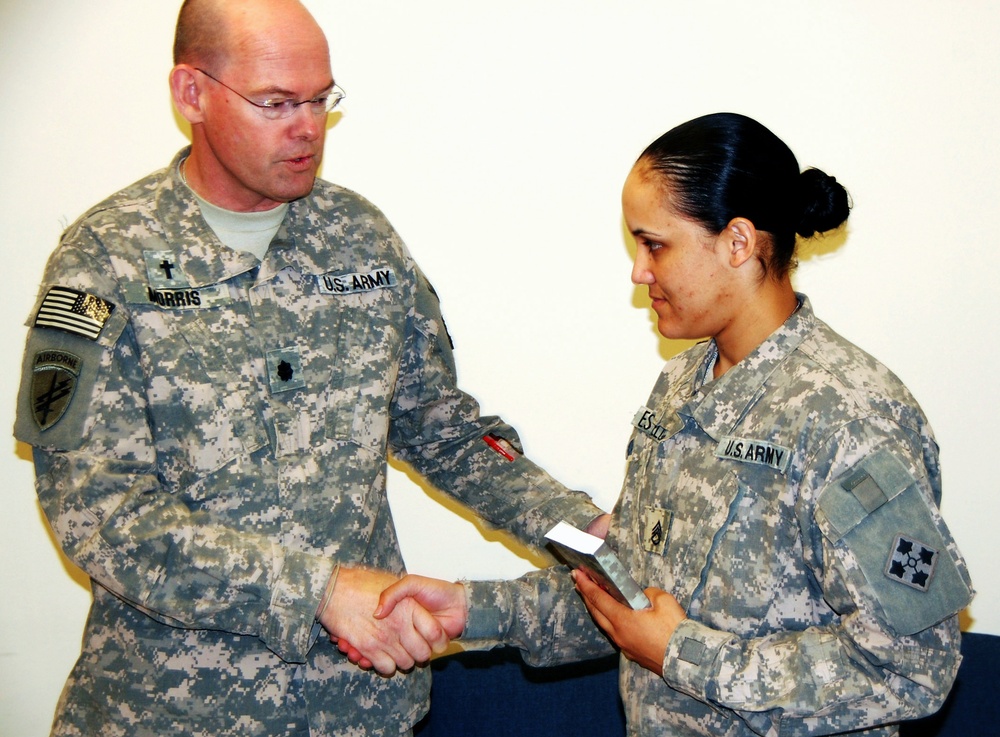 Army Chaplain Presents Bible to Chaplain's Assistant in Iraq