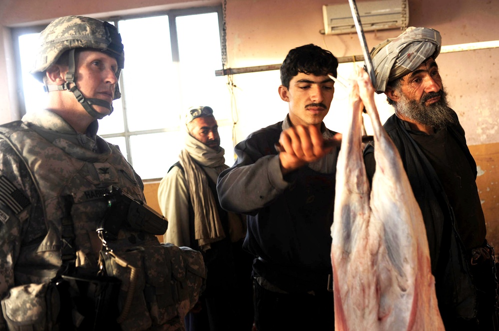 U.S. Army Colonel Oversees Sheep Processing at Afghan Slaughter Facility