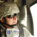 Air Force Captain Surveys Afghan Forward Operating Base from Army Helicopter