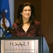 Army General's Wife Smiles at Husband's Remarks at Defense Department Conference