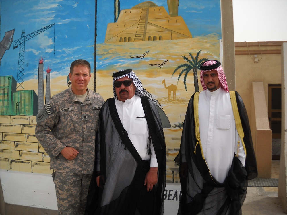 Iraqi and U.S. Military Leaders Pose for Photo at Contingency Operating Base Adder