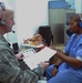 Air Force Doctor Demonstrates Portable Hearing Test Machine in Afghanistan