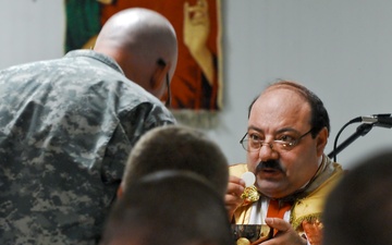 Soldiers Receive Communion from Bishop in Iraq