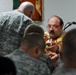 Soldiers Receive Communion from Bishop in Iraq