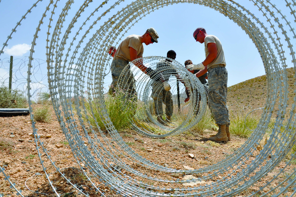 Soldiers Fortify Afghan Outpost with Concertina Wire
