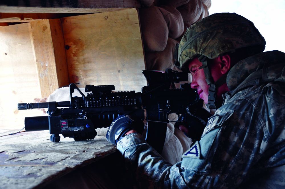 U.S. Soldier Stands Guard at Forward Operating Base in Afghanistan