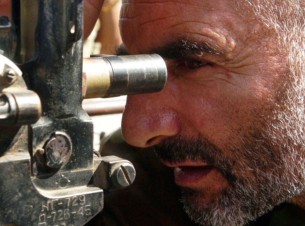 Afghan Artillery Officer Trains on D-30 Howitzer at Forward Operating Base