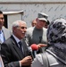 Iraqi Governor Visits Basra Trash Dump with U.S. Army Officer