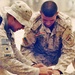 U.S. Soldier Trains Iraqi Counterpart on Battlefield First Aid