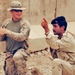 U.S. Army Paratrooper Trains Iraqi Soldier on Squad Formation During Sandstorm