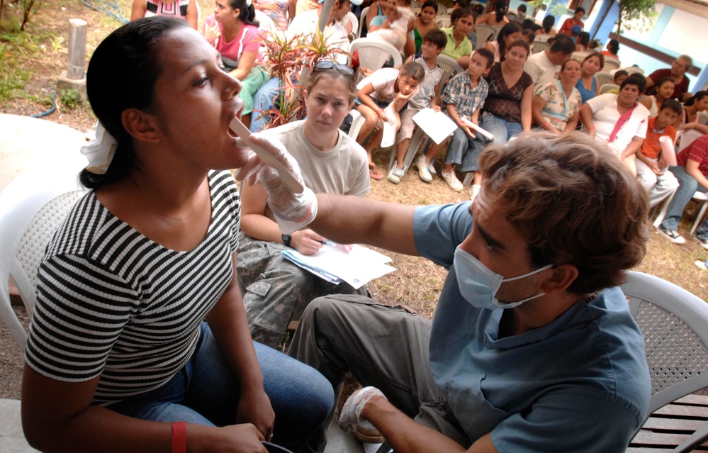Nicaraguan Girl Receives Dental Care from Dominican Dentist on Navy Humanitarian Mission