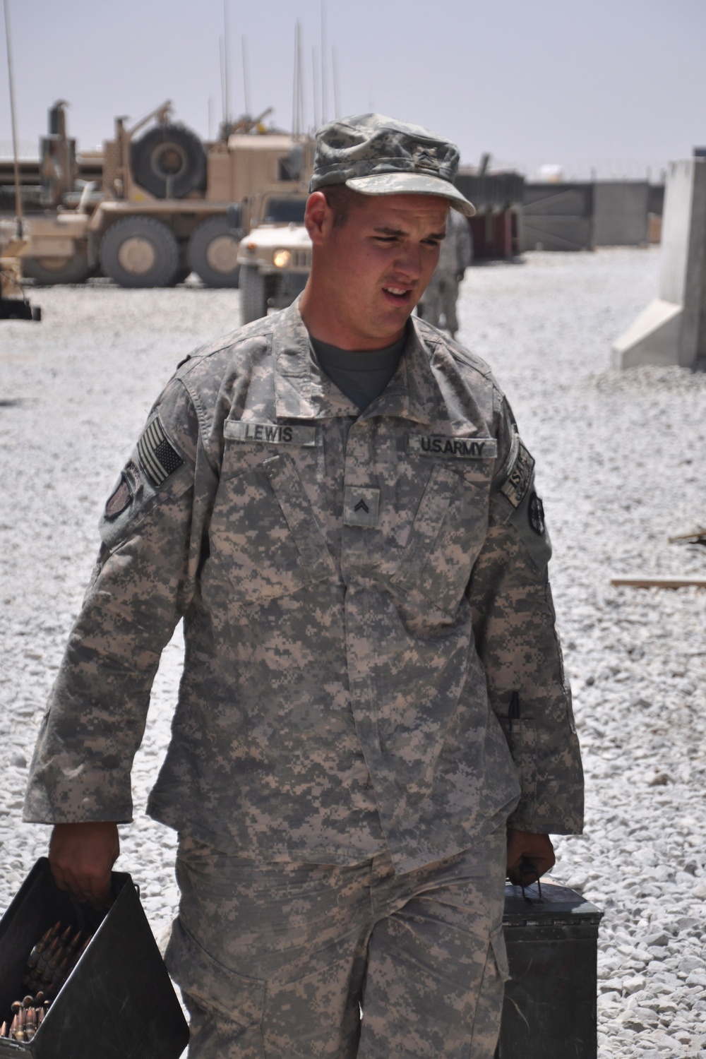 Army Cpl. Unloads Ammunition at Kandahar Airfield After Combat Logistics Patrol
