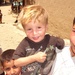 Local Children Pose for Photo During U.S. Army Agribusiness Visit in Afghanistan
