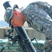 Army Gunnery Sergeant Checks Mortar Tube Azimuth in Afghanistan