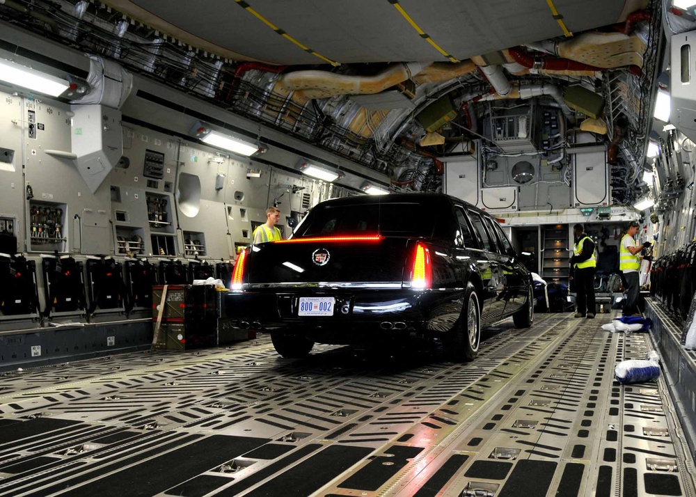 Airmen Assist in Offloading Presidential Limousine for Obama's Ghana Visit