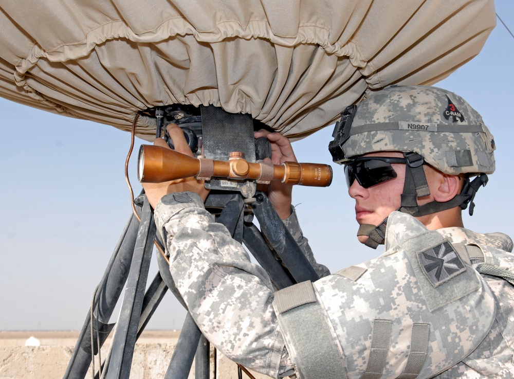 Army Soldier Calibrates Radar System in Iraq
