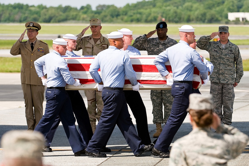 Solemn Ceremony Honors Fallen Petty Officer at Dover Air Force Base