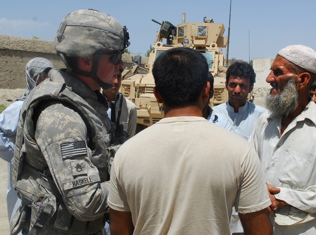 Army NCO Engages Village Elder During Afghan Election Preparations