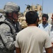 Army NCO Engages Village Elder During Afghan Election Preparations