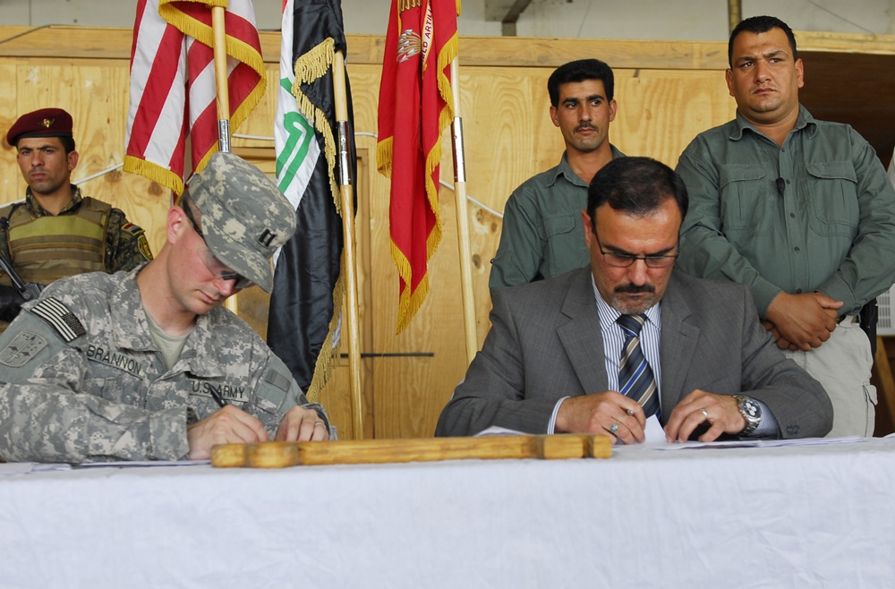Iraqi, U.S. Forces Sign Transfer of Combat Outpost Summers